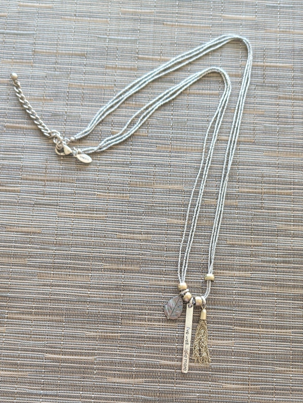 Multi-Strand Silver Tone Pendant Necklace with Tassel